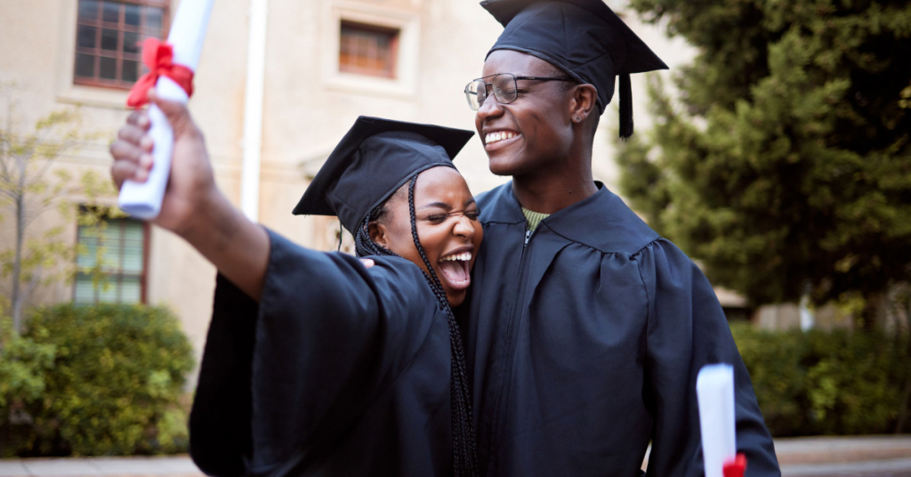 Black students, hug and celebration for graduation, education and achievement on university, campus and success